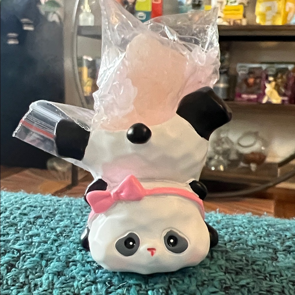 Adorable Panda Figurine with Pink Bow